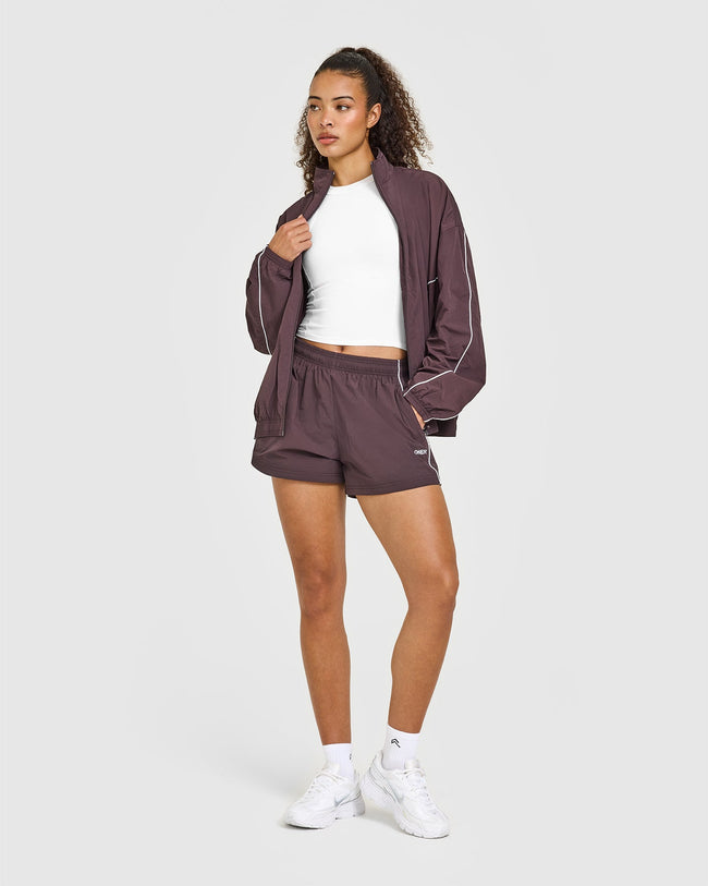 Q3COLOURINJECTION_OVERSIZED_WOVEN_SHORTS_DARKUMBERBROWN_250619_PDP_1440x1800_03_650x.jpg