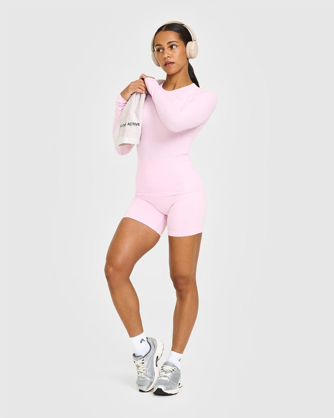 Q3_COLOUR_INJECTION_GO_TO_SEAMLESS_FITTED_LONG_SLEEVE_TOP_CHALKPINK_250623_PDP_1440x1800_03_650x.jpg
