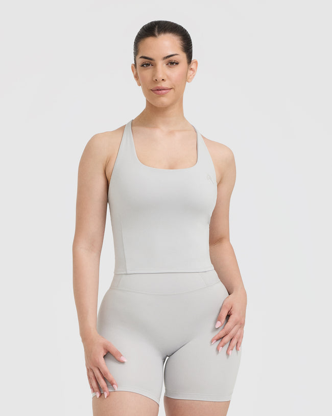TIMELESS_SQUARE_NECK_MID_VEST_LIGHT_GREY_MARL_01_fe2bc62a-ff88-44ee-b60b-c987f02b8a33_650x.jpg