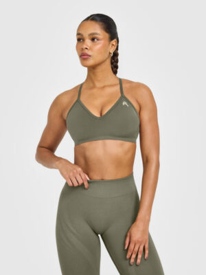 ENHANCELIFT SEAMLESS STRAPPY SPORTS BRA WITH WHITE LOGO