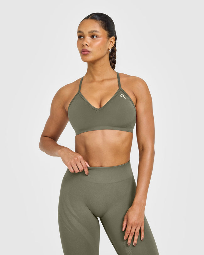 WINTER_SEASONAL_ENHANCELIFT_SEAMLESS_STRAPPY_SPORTS_BRA_ALPINEGREEN_250916_PDP_1440x1800_01_5b4dc27a-6d32-4efc-9063-522b160c785a_650x.jpg