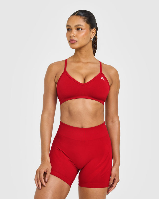 WINTER_SEASONAL_ENHANCELIFT_SEAMLESS_STRAPPY_SPORTS_BRA_LIGHTTOASTEDRED_250916_PDP_1440x1800_01_9bf16d9b-99c1-4142-8a62-d27dae065bd9_650x.jpg